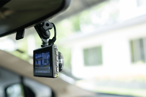 Car dash camera mounted at the front windshield.