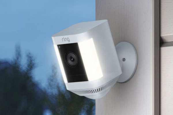 Ring Spotlight Security Camera installed on the outside of a house.