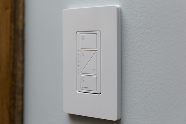 Smart light switch installed in a home.