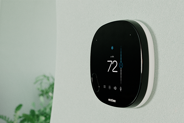 Smart thermostat installed in a home.